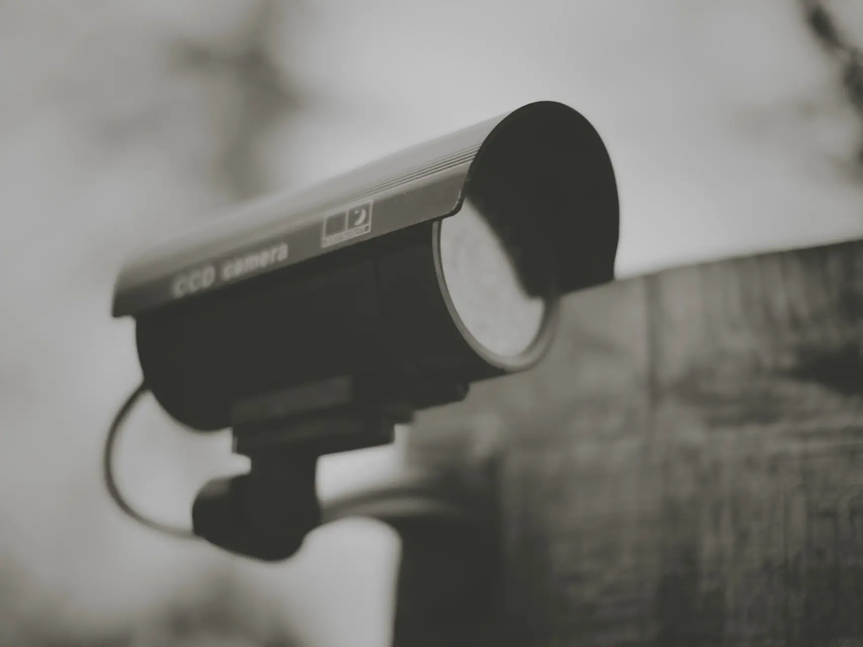 black and silver camera on black stand