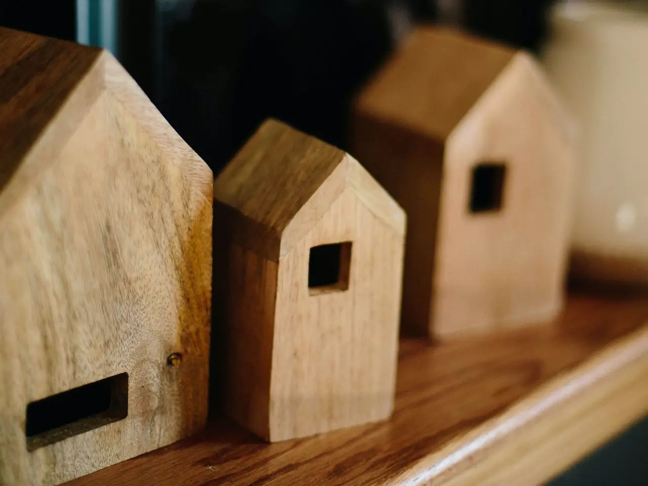 shallow focus photo of brown wooden house miniature